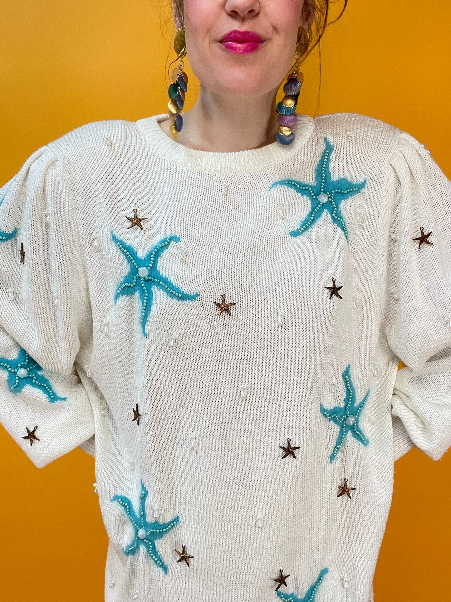 Maritimer 80s Stricksweater mit Seesternen und Perlenbesatz