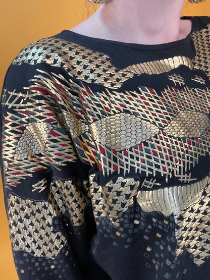 Glamouröses Longsleeve mit goldener Schlange in Hahnentrittprint
